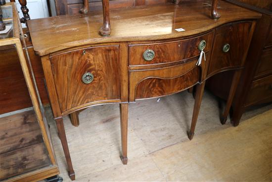 Georgian style mahogany serpentine sideboard